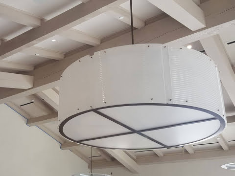 Large round ceiling light fixture installation by Sloan Electric, LLC