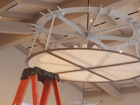 Large round ceiling light fixture installation by Sloan Electric, LLC
